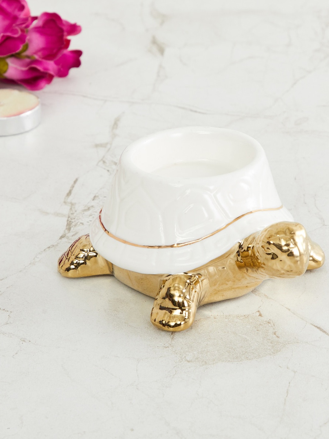 

Home Centre Gold-Toned & White Textured Brighton Turtle T-Light Holder