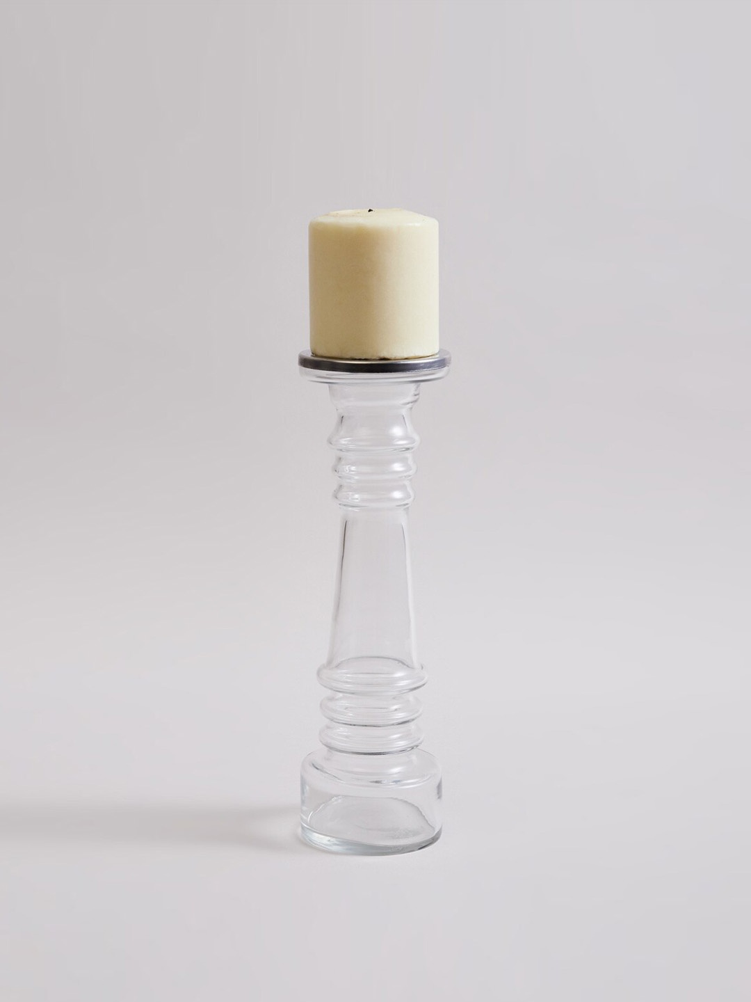 

Home Centre Transparent Solid Glass Candle Holder
