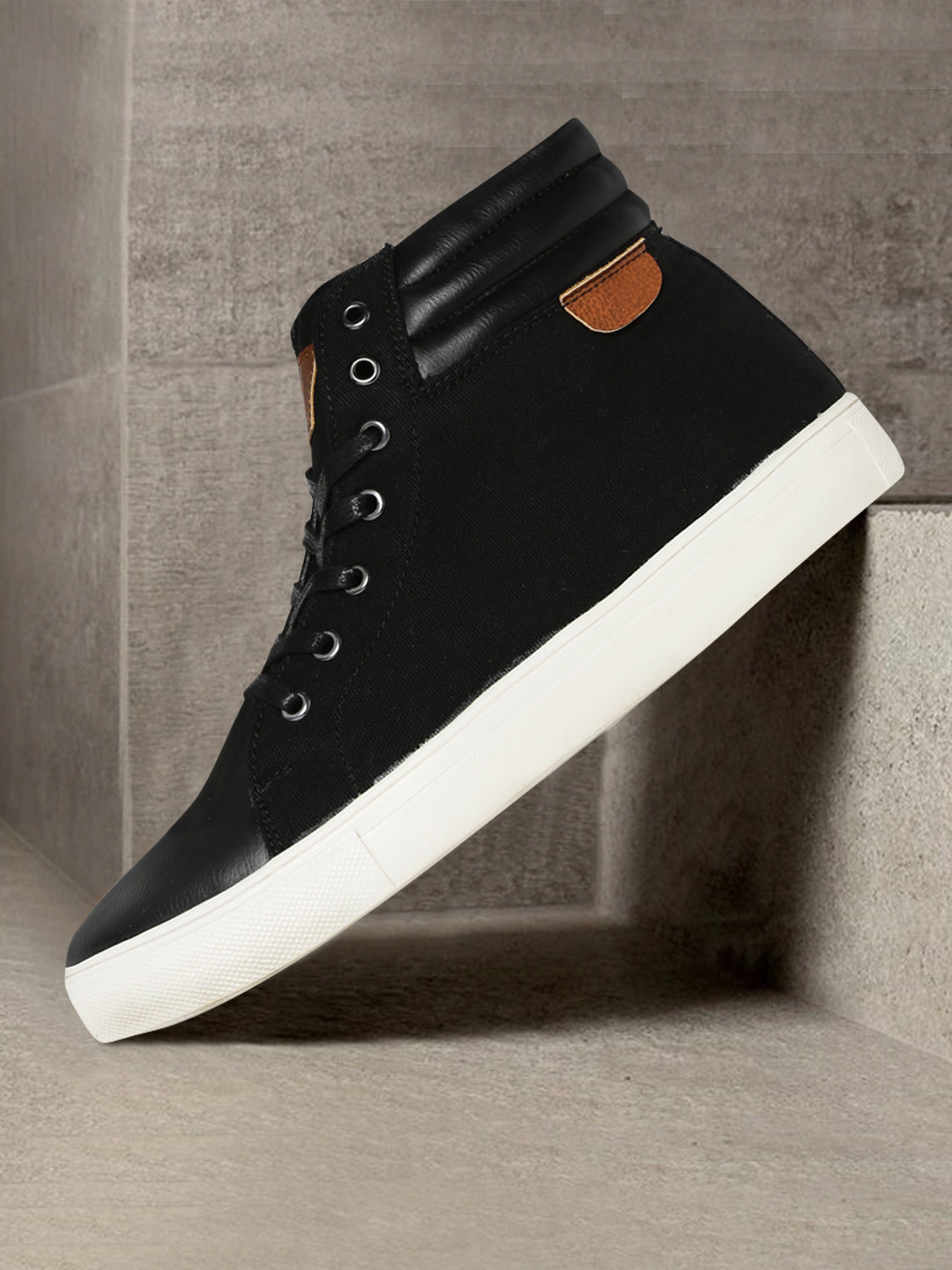 

Roadster Women Black Solid Mid-Top Sneakers