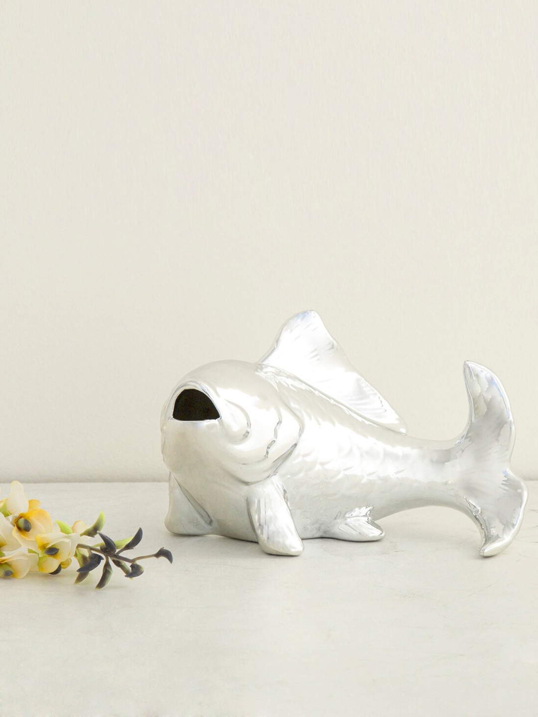 

Home Centre Silver-Toned Fish Figurine Showpieces
