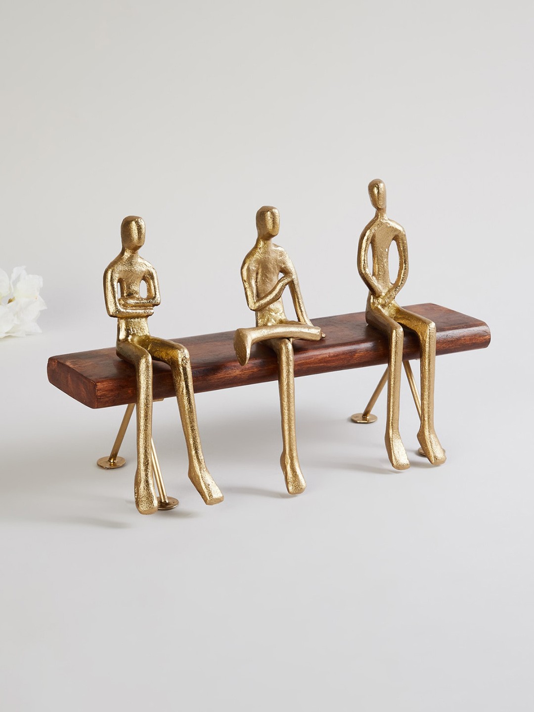 

Home Centre Gold-Toned Sculpture Sitting Table Accent With Wood Base Showpiece