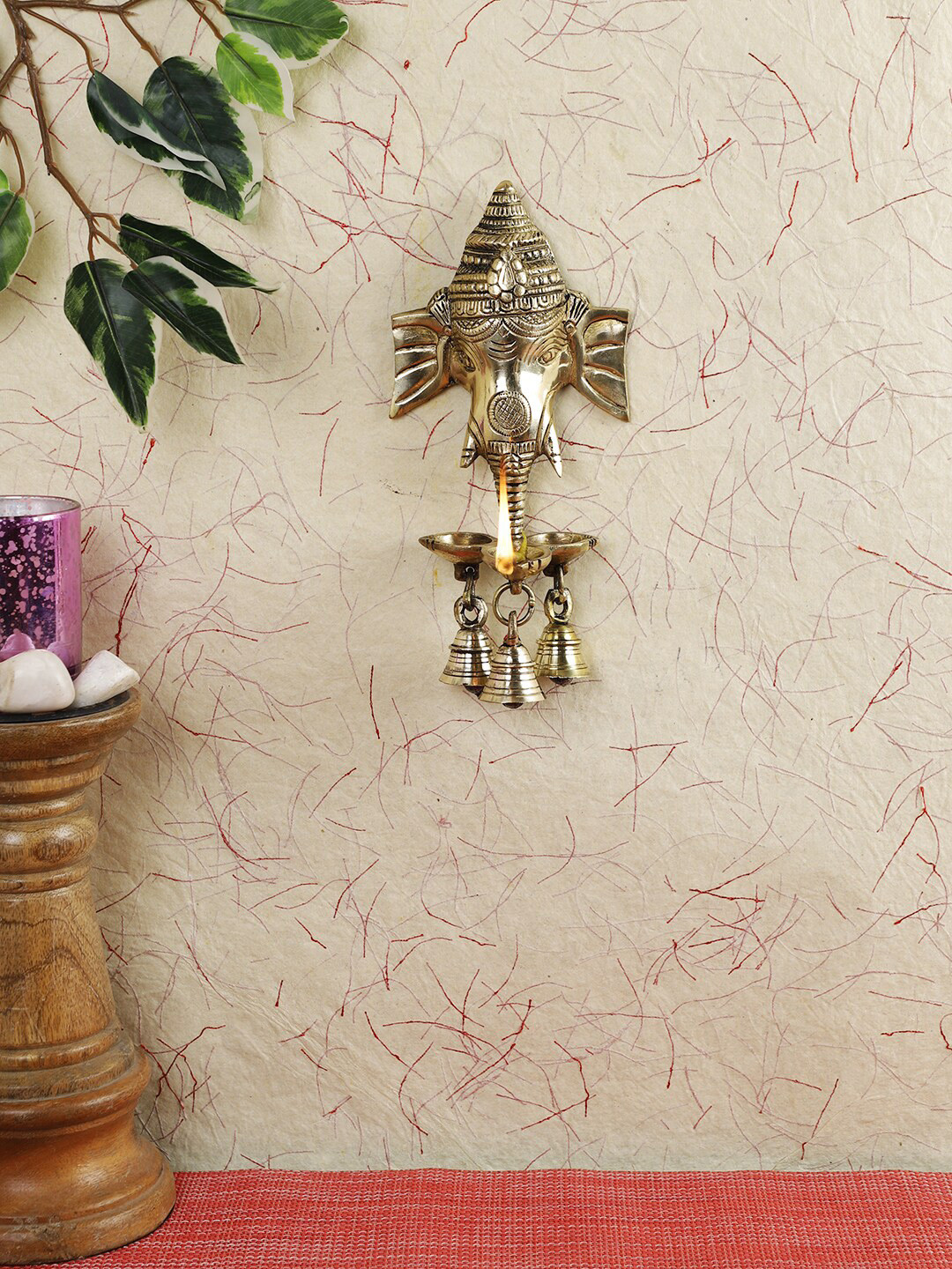 

Imli Street Gold-Toned Ganesh Design Wall Hanging With Diyas & Bells