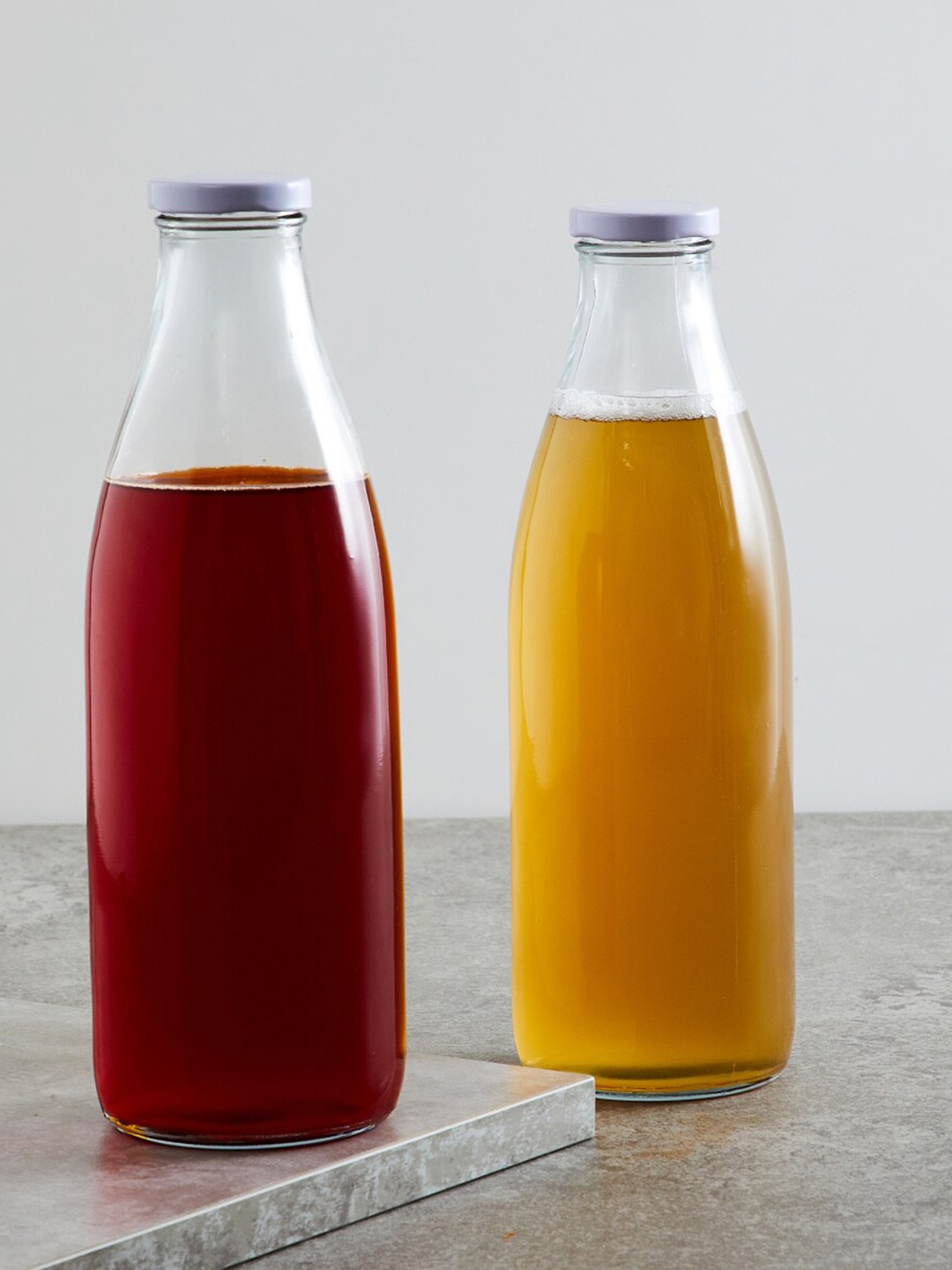 

Home Centre Set of 2 Transparent Solid Glass Water Bottle