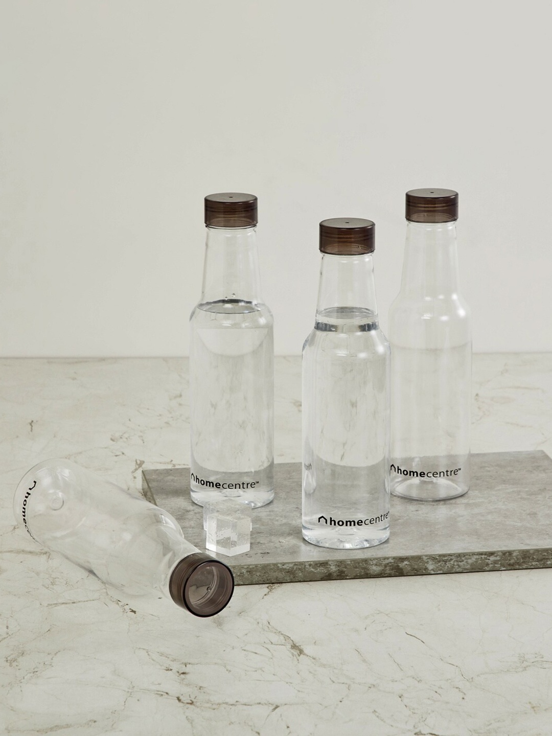 

Home Centre Set of 4 Transparent & Black Solid Corsica Water Bottles 1000 ML