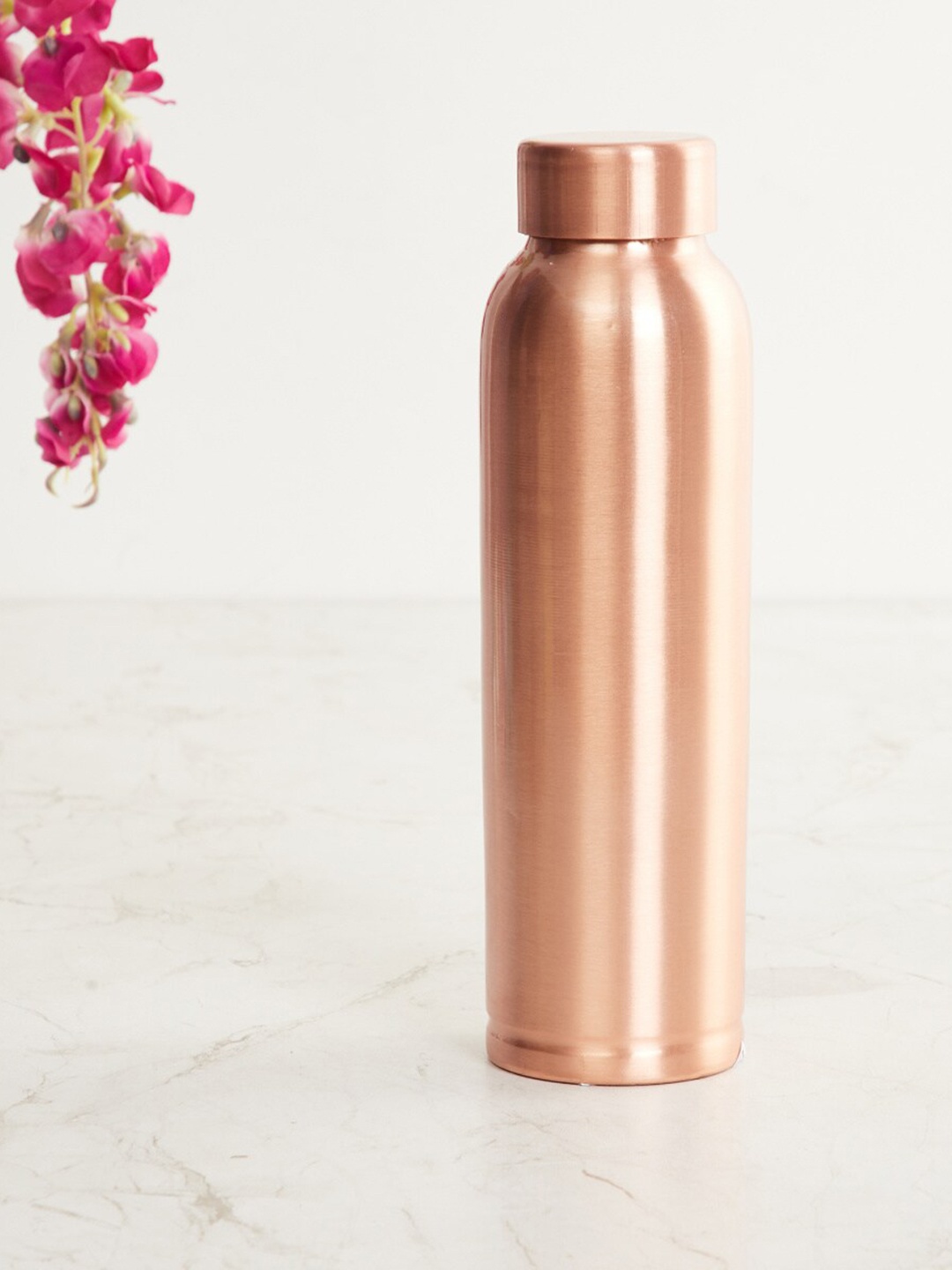 

Home Centre Copper Solid Water Bottle 950 ML