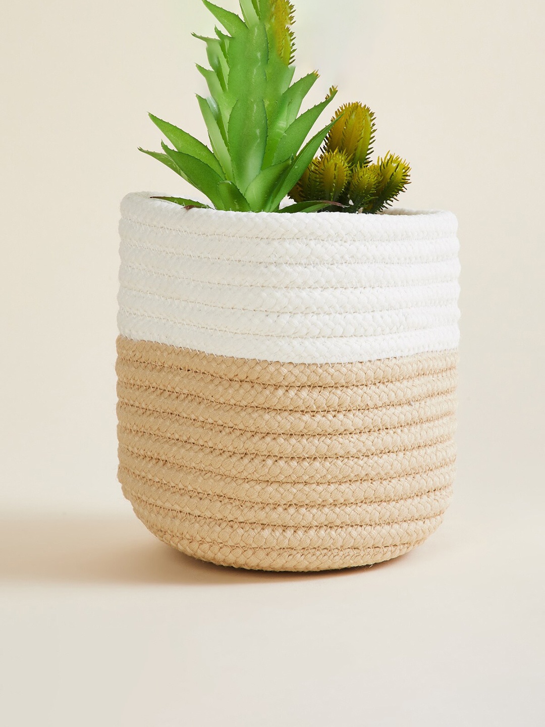 

Home Centre White & Beige Braided Jute Planter