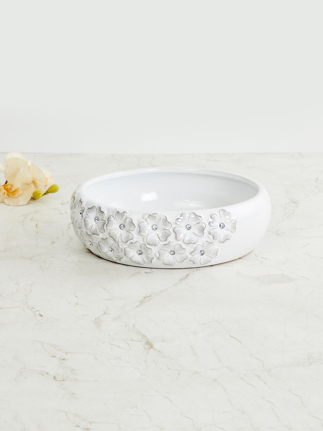 

Home Centre White Floral Textured Decorative Bowl
