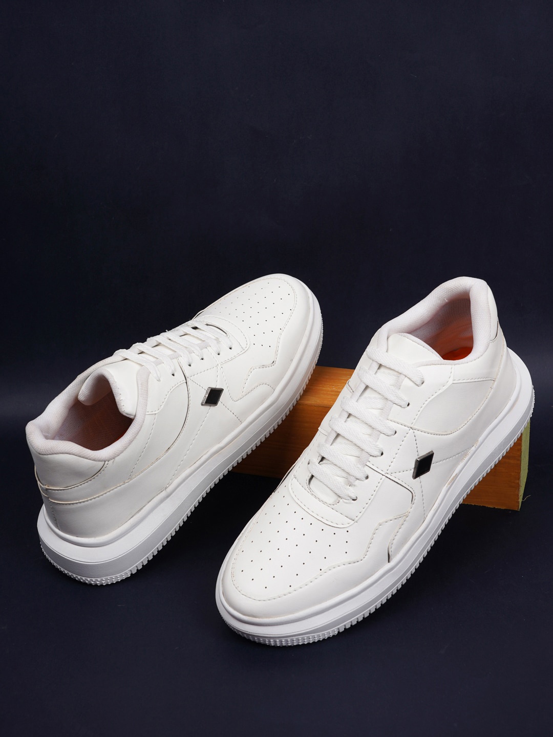 

Get Glamr Men White Perforations Regular Height Synthetic Leather Sneakers