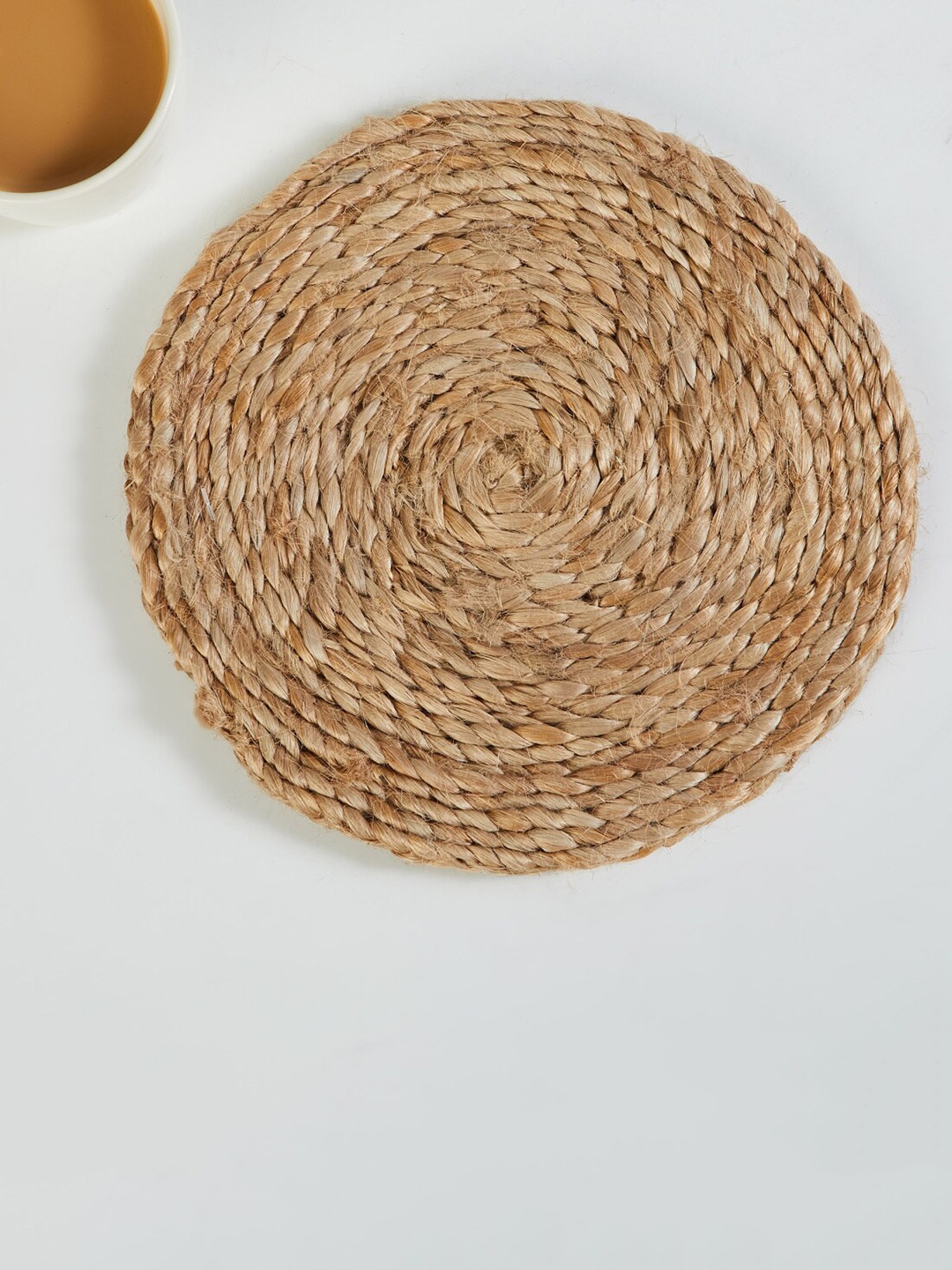 

Home Centre Unisex Brown Textured Round Jute Trivet