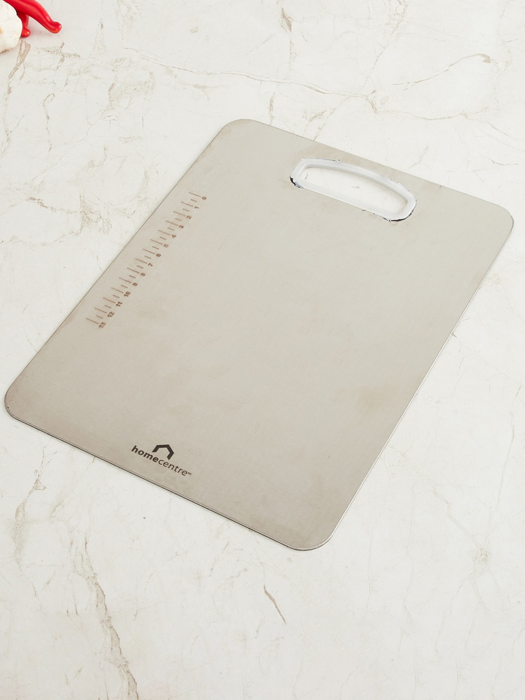 

Home Centre Silver-Toned Solid Chopping Board