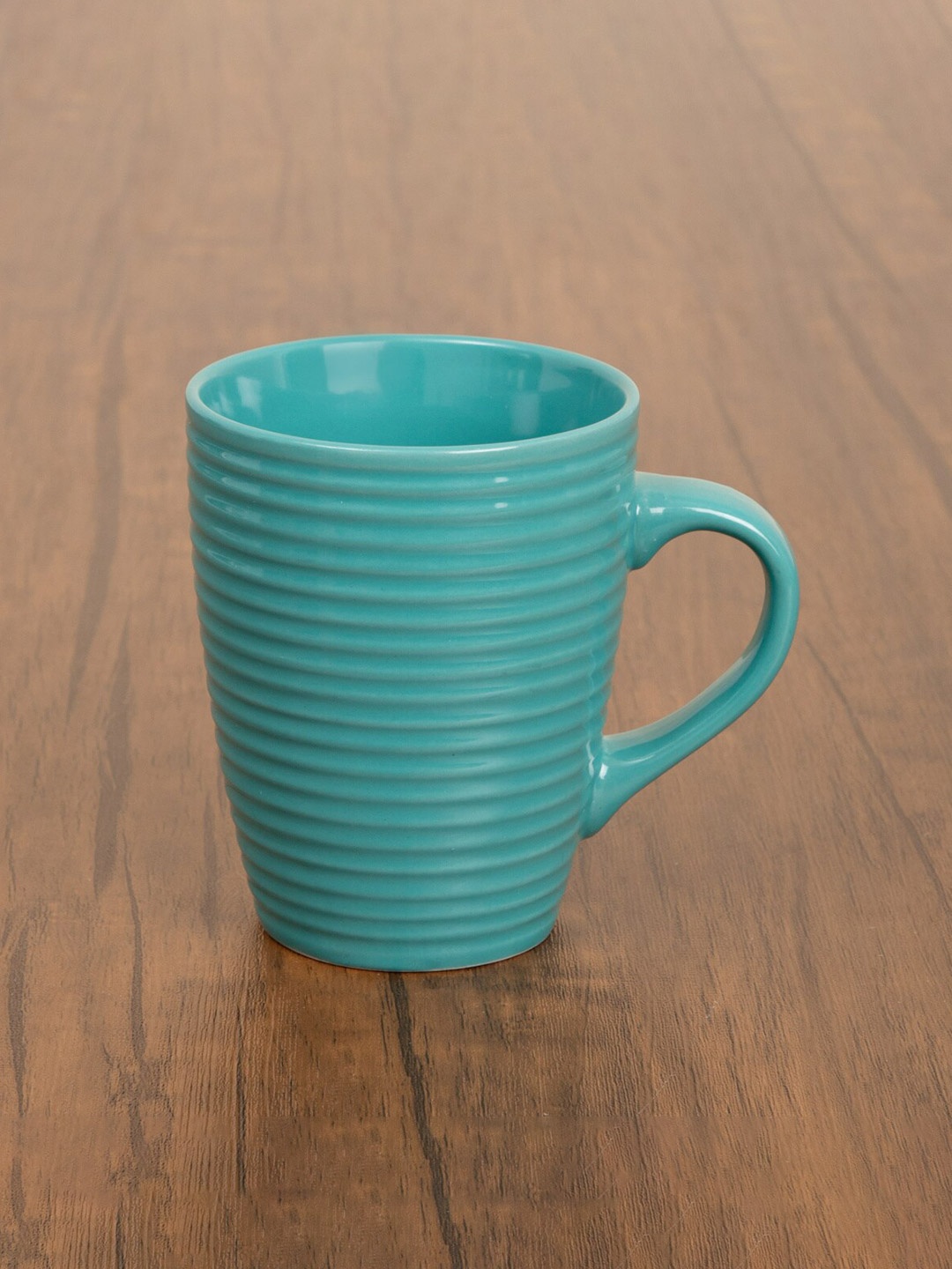 

Home Centre Turquoise Blue Solid Stoneware Glossy Mug