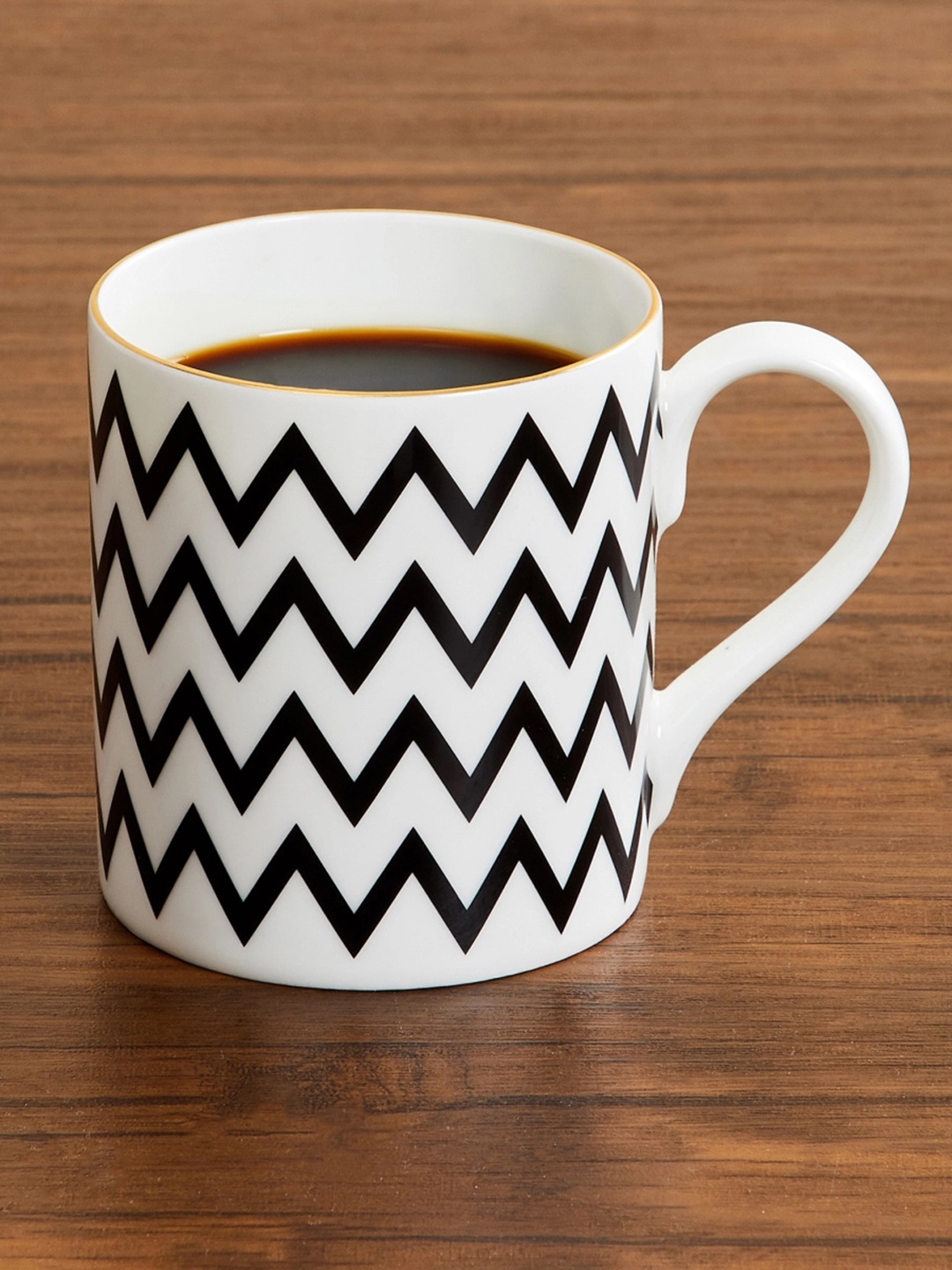 

Home Centre White & Black Geometric Printed Bone China Glossy Mug 400 ml