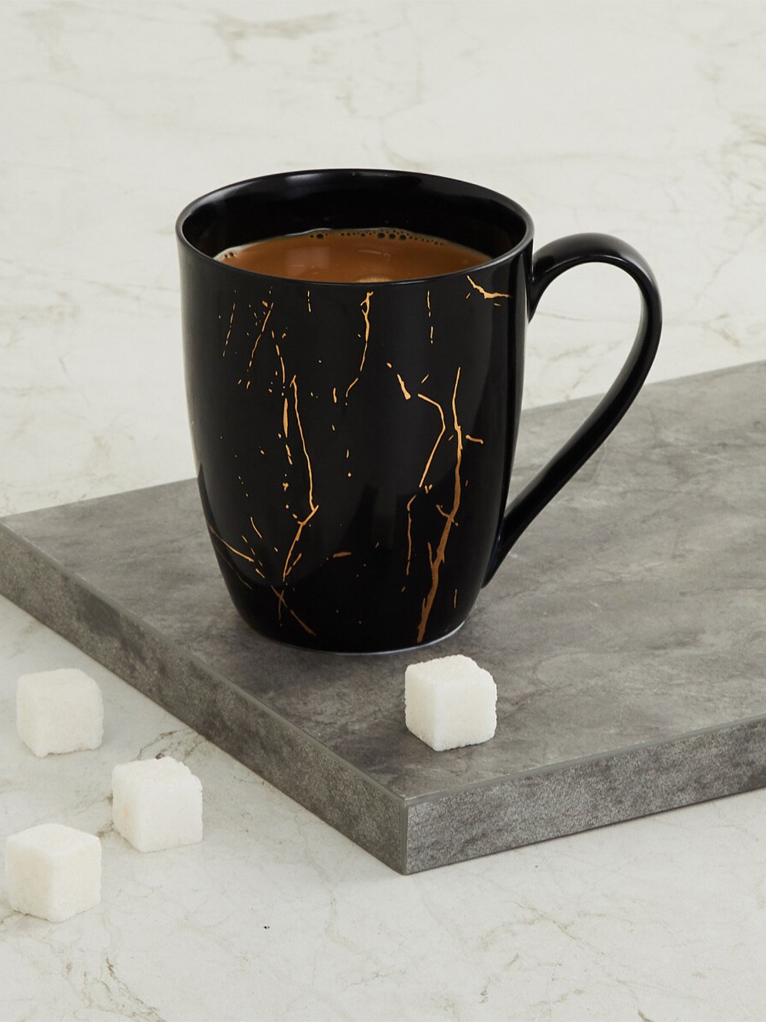 

Home Centre Black & Brown Printed Bone China Glossy Mug