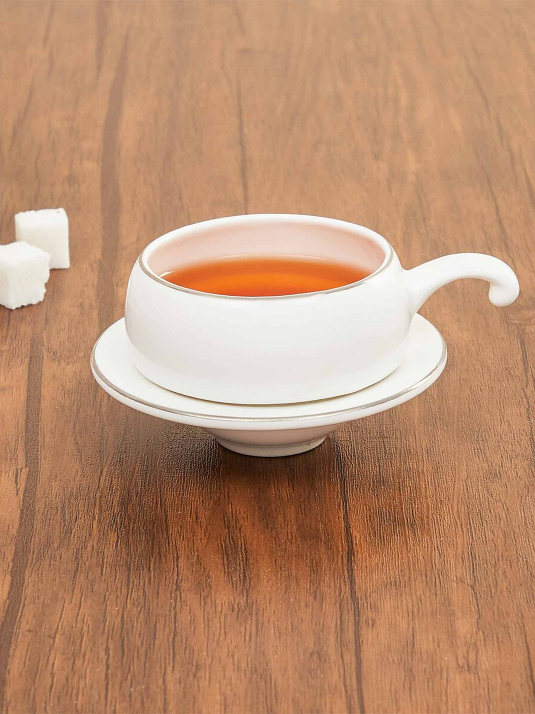 

Home Centre White Solid Bone China Glossy Cup and Saucer