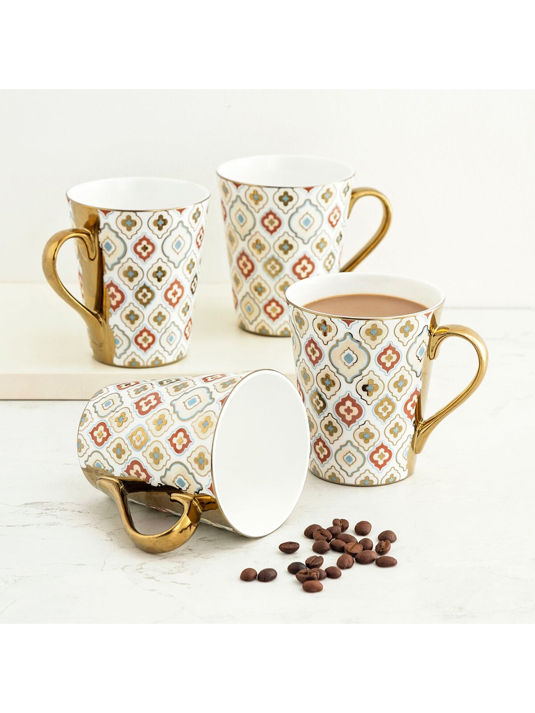 

Home Centre Set of 4 White & Red Ethnic Motifs Printed Bone China Glossy Mugs