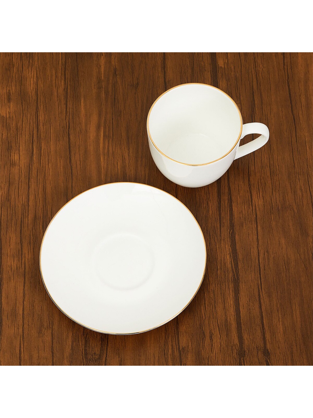 

Home Centre White Solid Bone China Glossy Cup