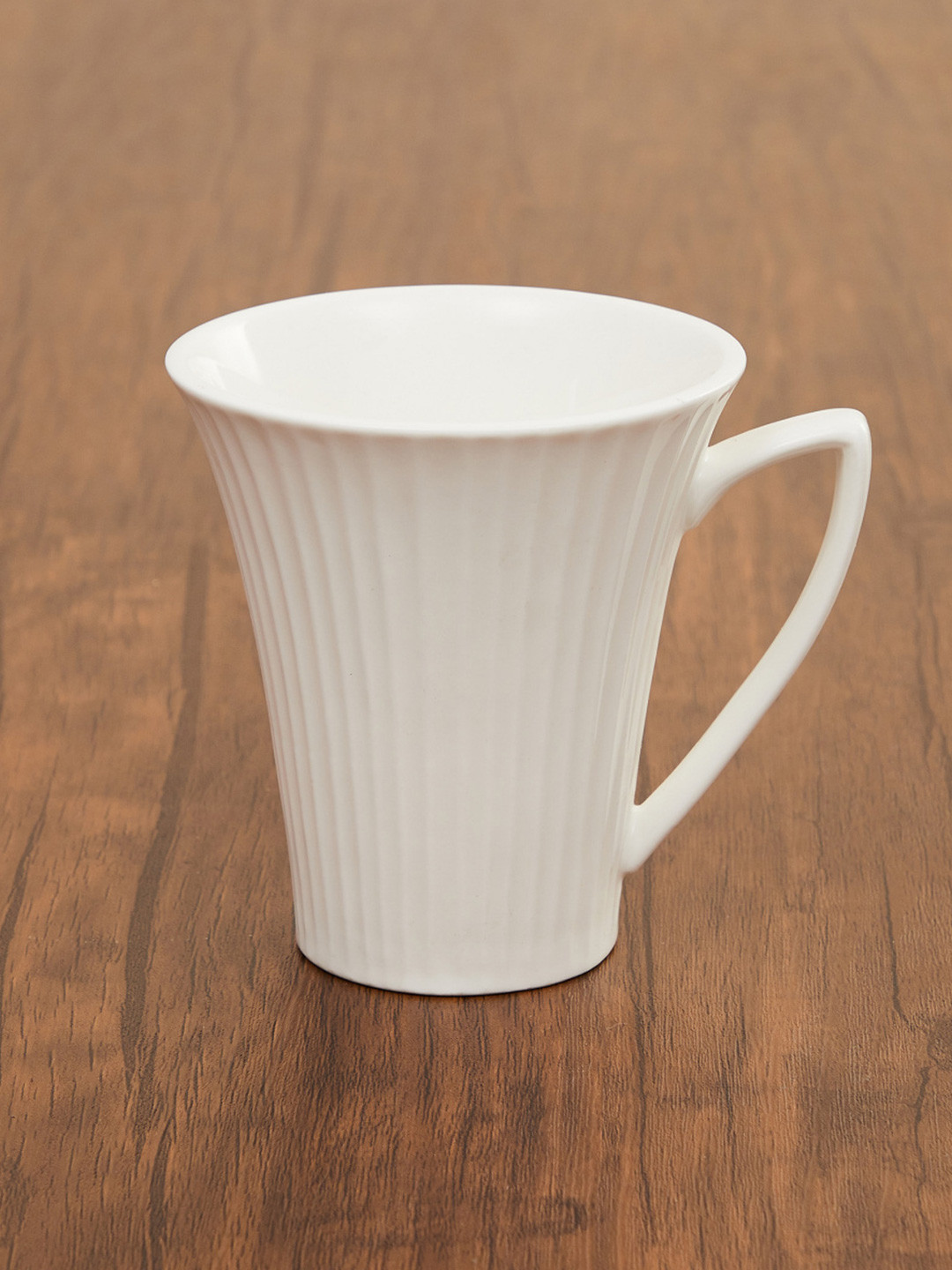 

Home Centre White Textured Ceramic Glossy Mug