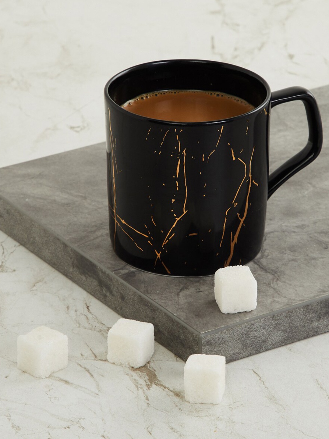 

Home Centre Black 1 Piece Marble Patterned Bone China Glossy Mug