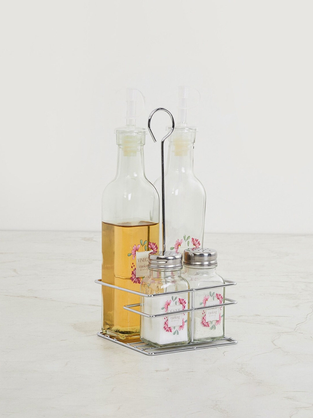 

Home Centre Transparent Glass Oil Bottle Set With Stand