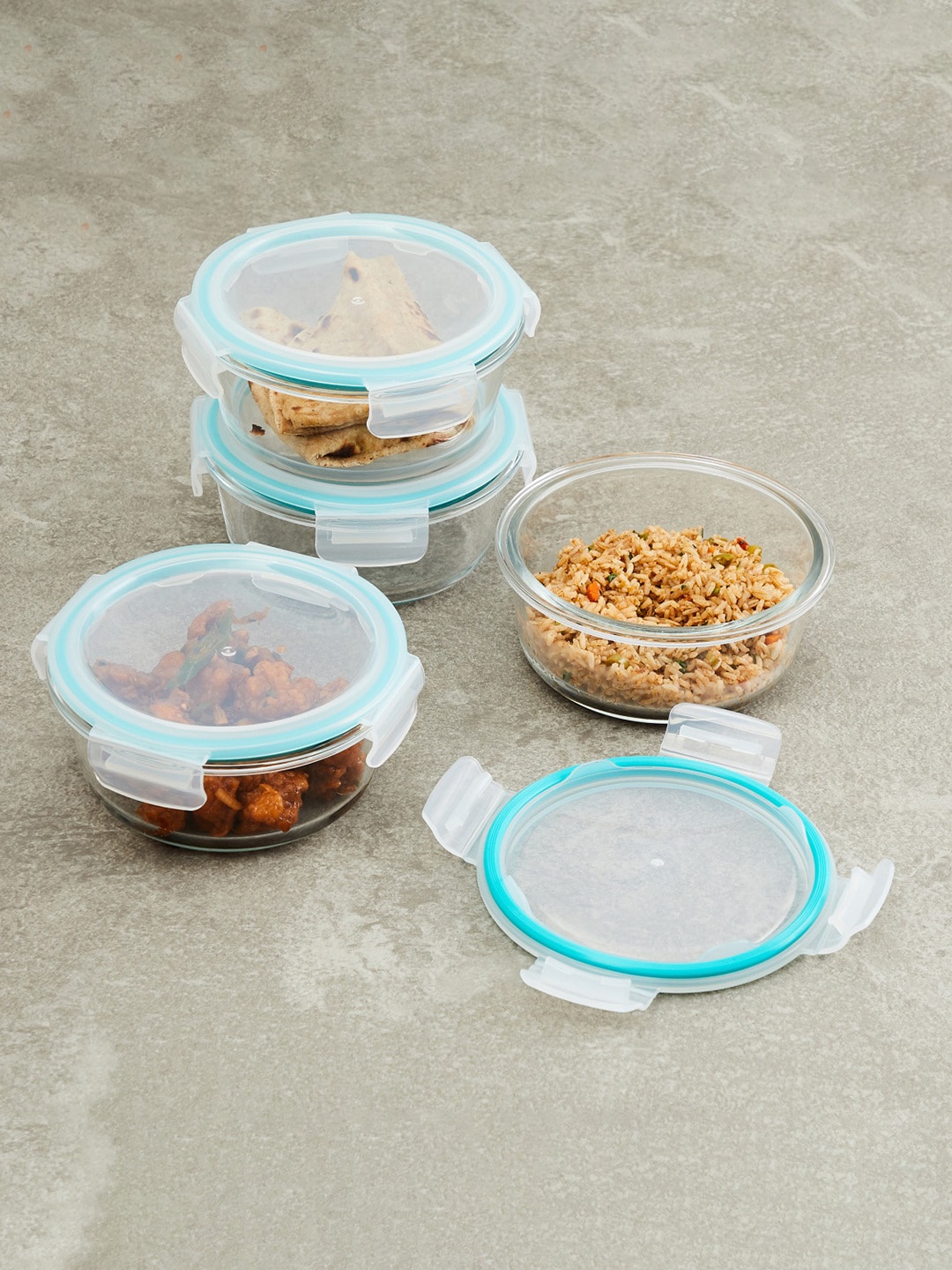 

Home Centre Set Of 4 Transparent & Blue Glass Storage Containers
