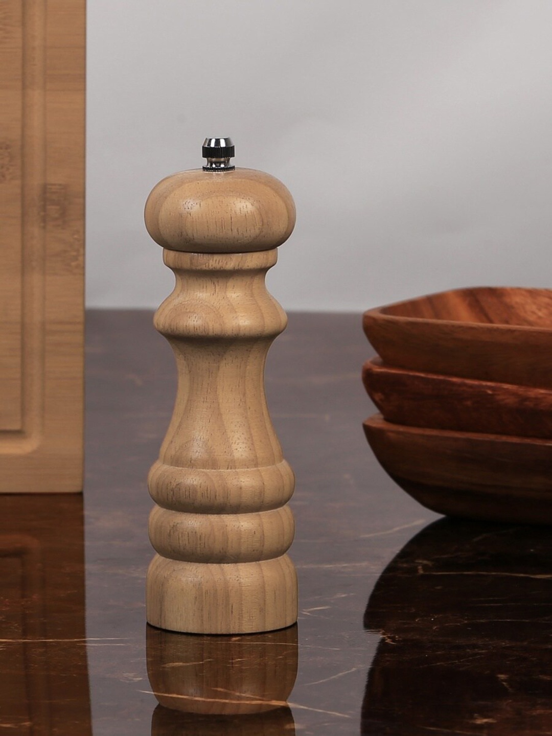 

Home Centre Brown Solid Wooden Truffels Pepper Mill