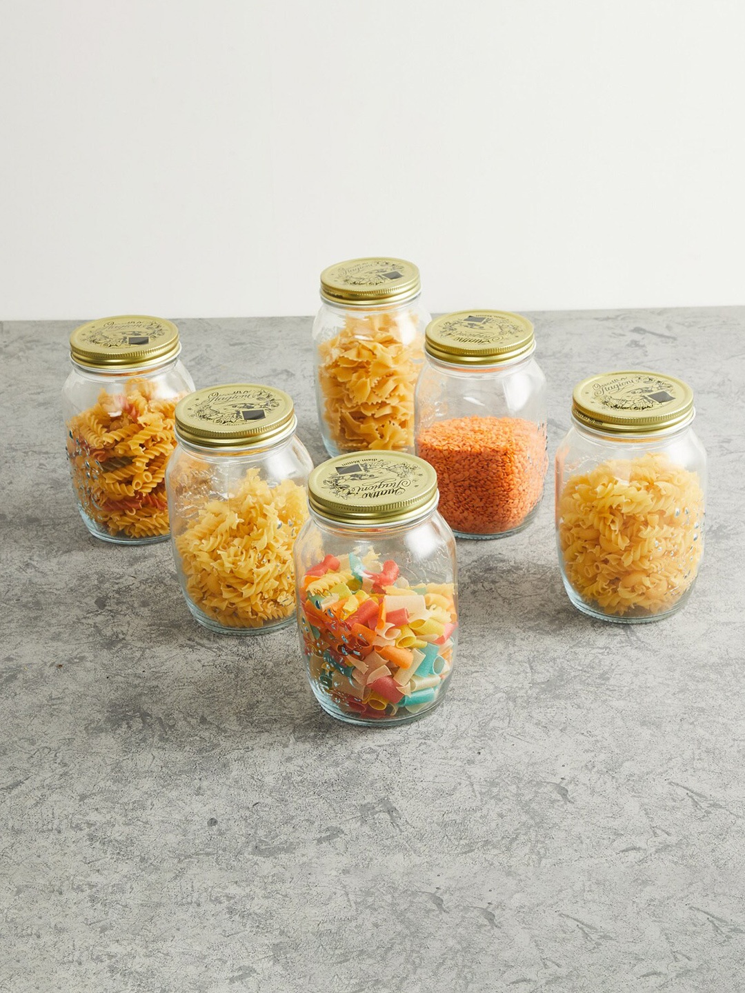 

Home Centre Set Of 6 Transparent & Golden Glass Container With Lid 1000 ML