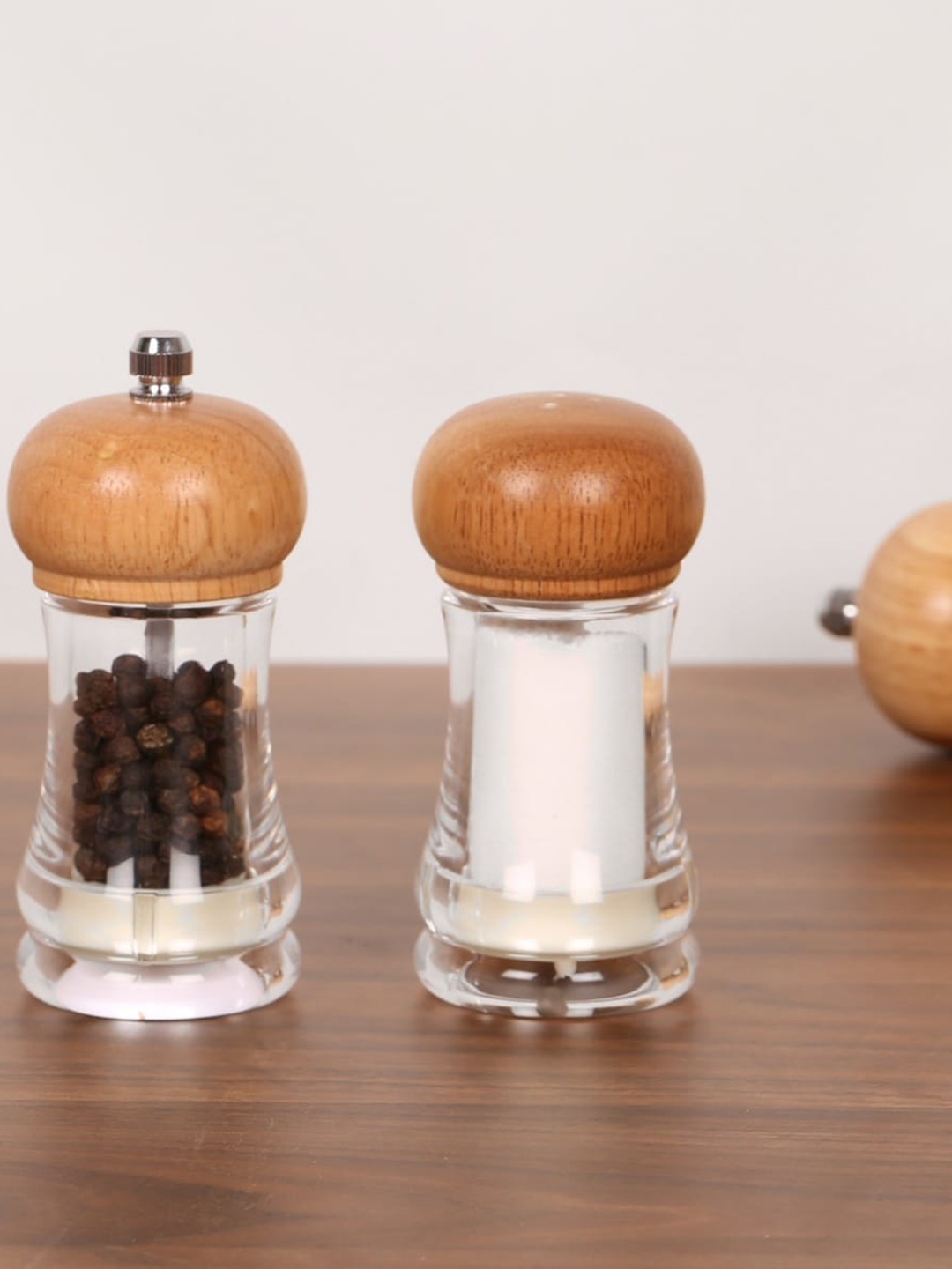 

Home Centre Transparent Solid Truffels Pepper Mill & Salt Shaker Set