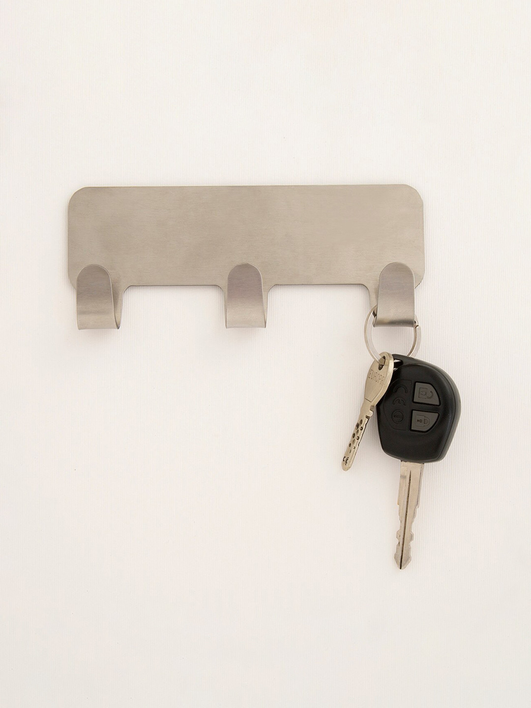 

Home Centre Silver Toned Solid Stainless Steel Adhesive Hook With 3 Knobs