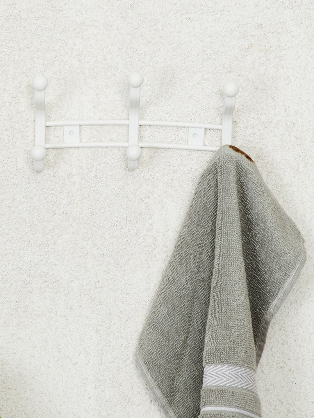 

Home Centre White Solid Metal Dual Wall Hook With 3 Knobs