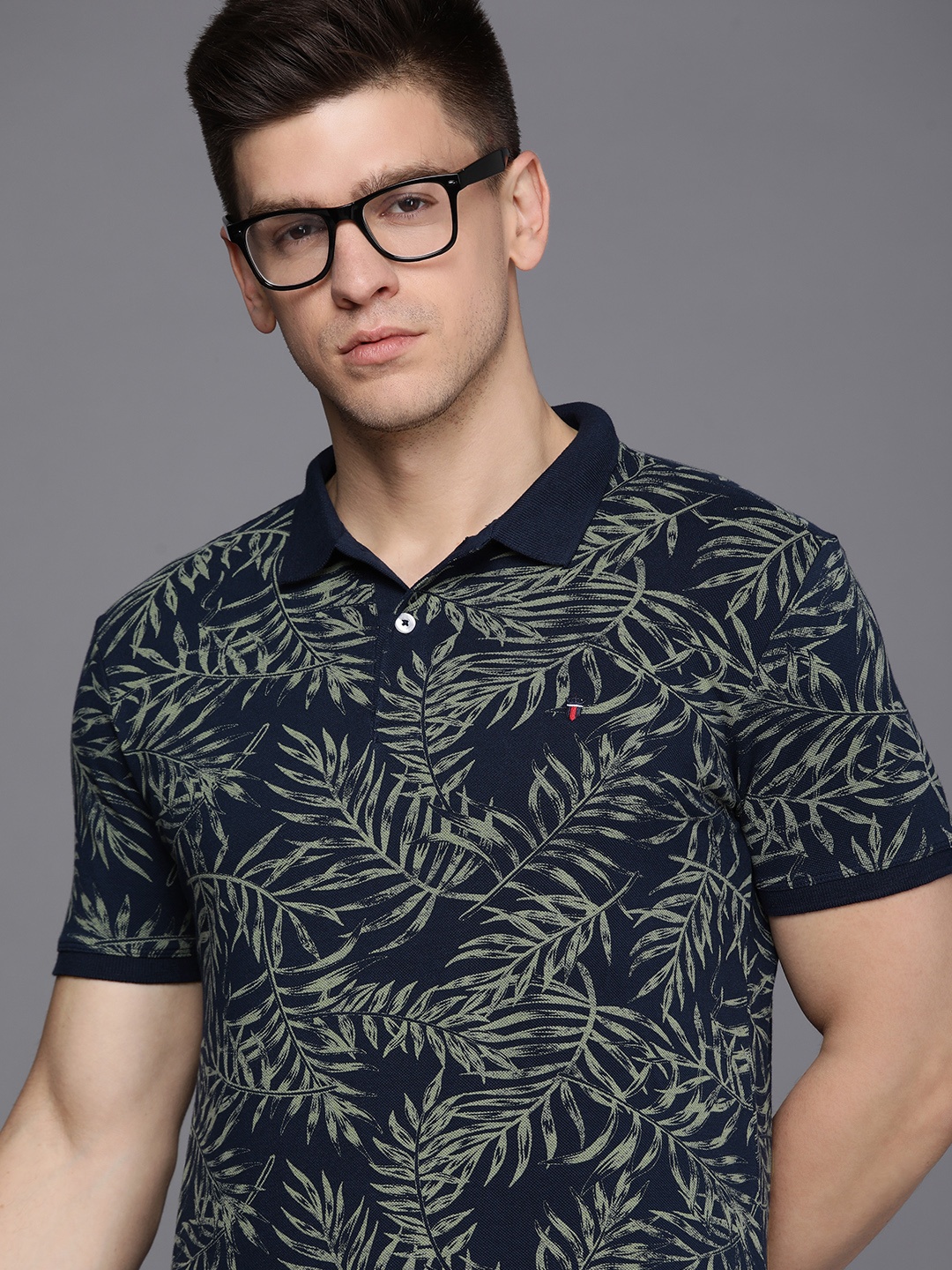 

Louis Philippe Jeans Men Navy Blue & Green Polo Collar Tropical Pure Cotton T-shirt