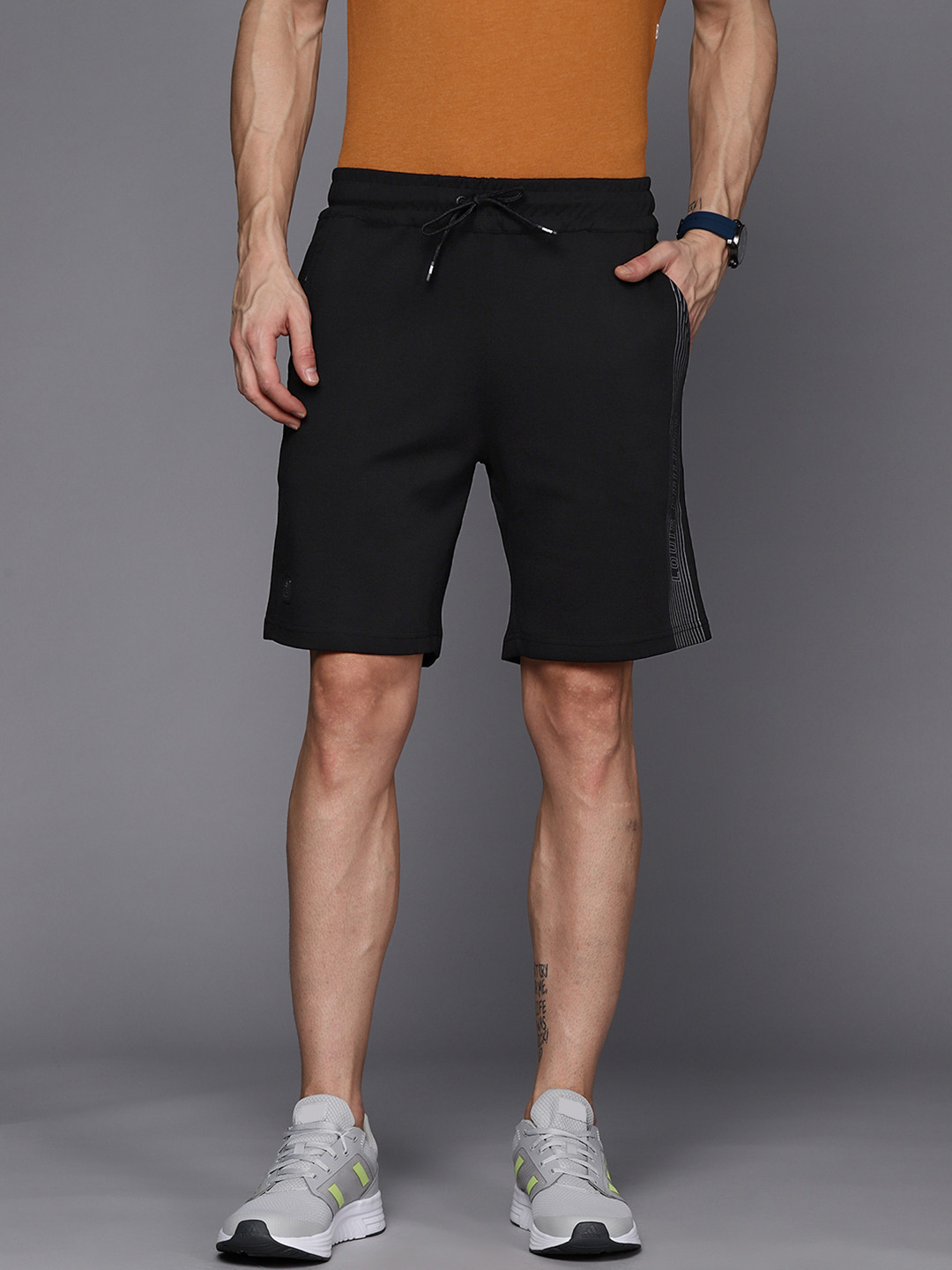 

Louis Philippe ATHPLAY Men Black Solid Mid-Rise Regular Knitted Shorts