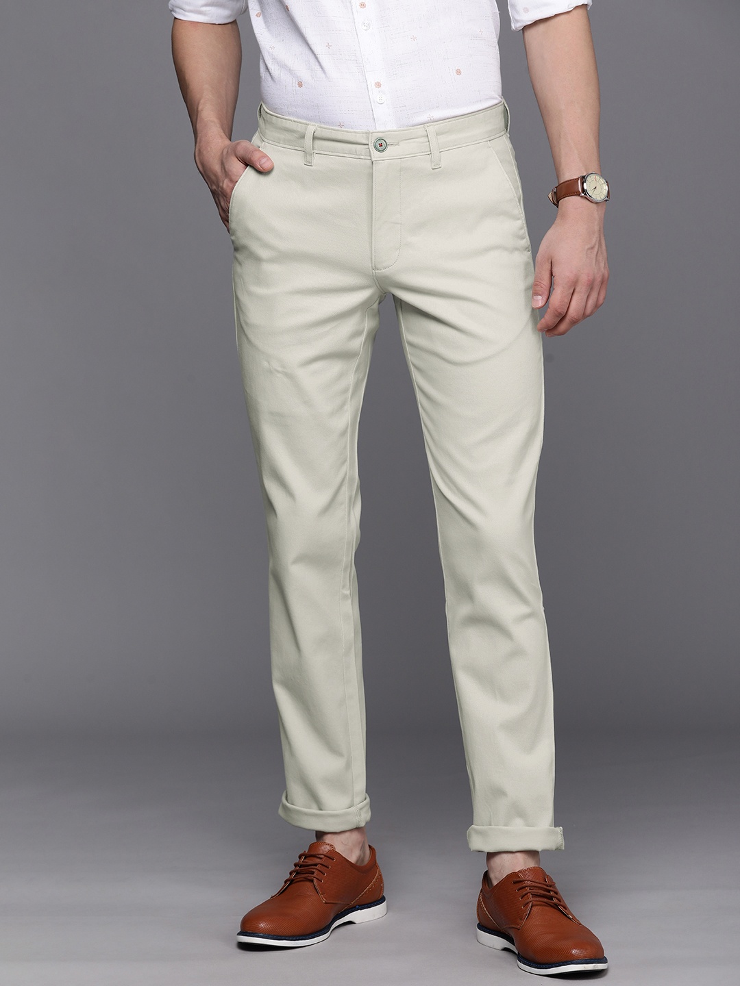 

Louis Philippe Sport Men Beige Slim Fit Mid-Rise Regular Trousers