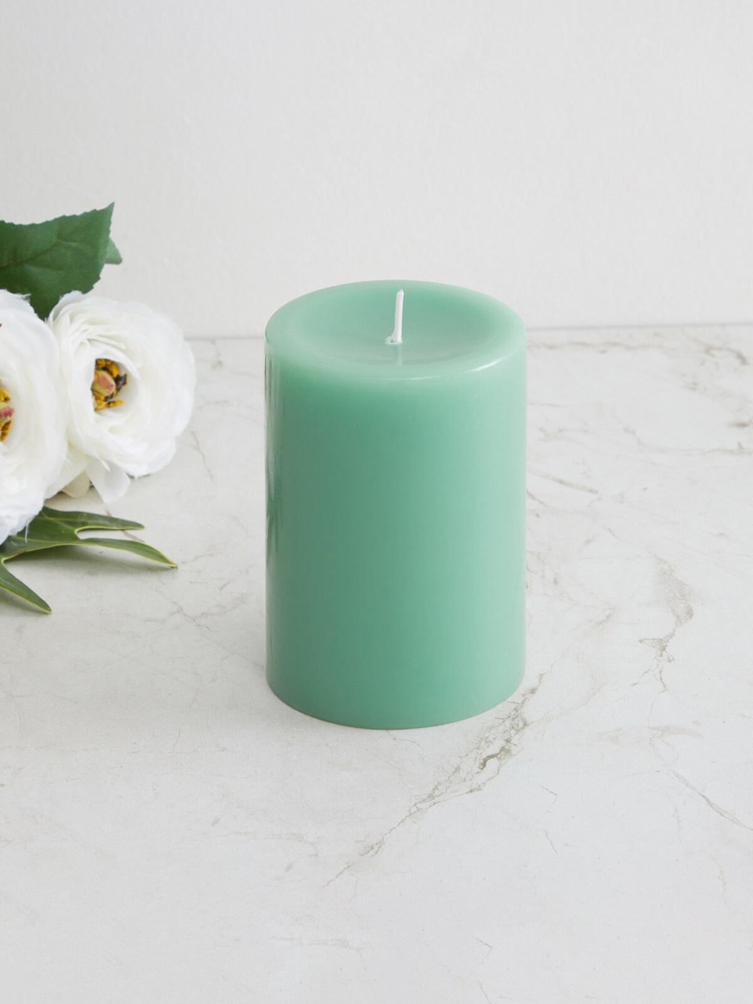 

Home Centre Green Solid Single Wax Pillar Candle