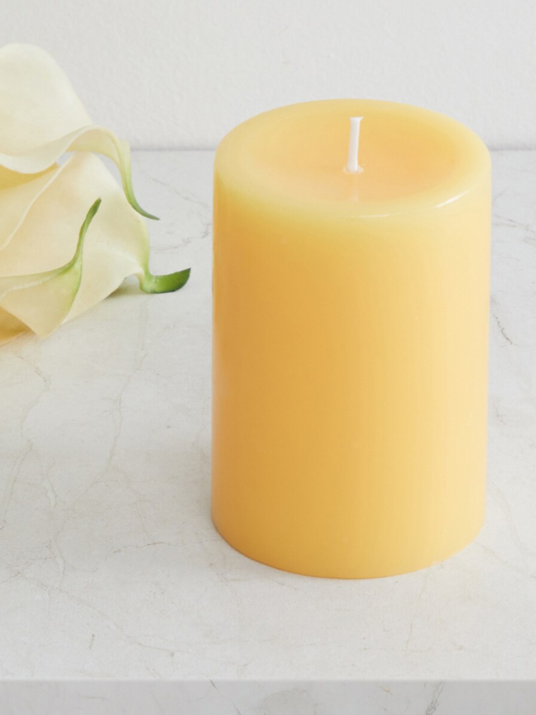 

Home Centre Yellow Colour Connect Solid Round Pillar Candle
