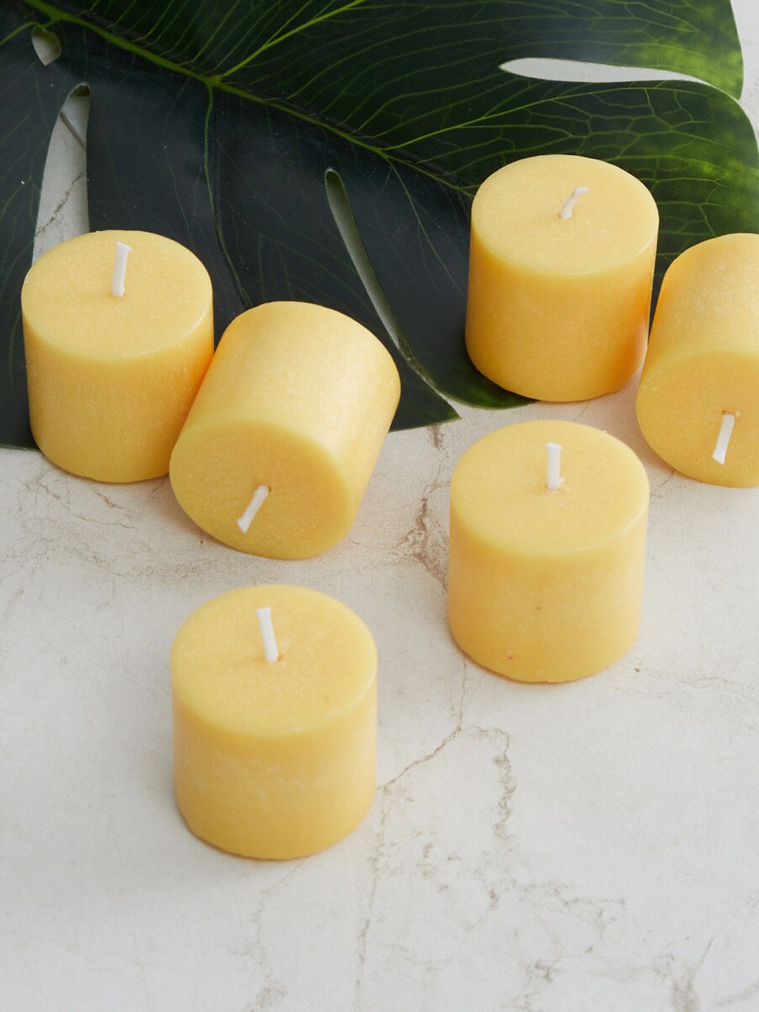 

Home Centre Set Of 6 Yellow Solid Round Pillar Candles