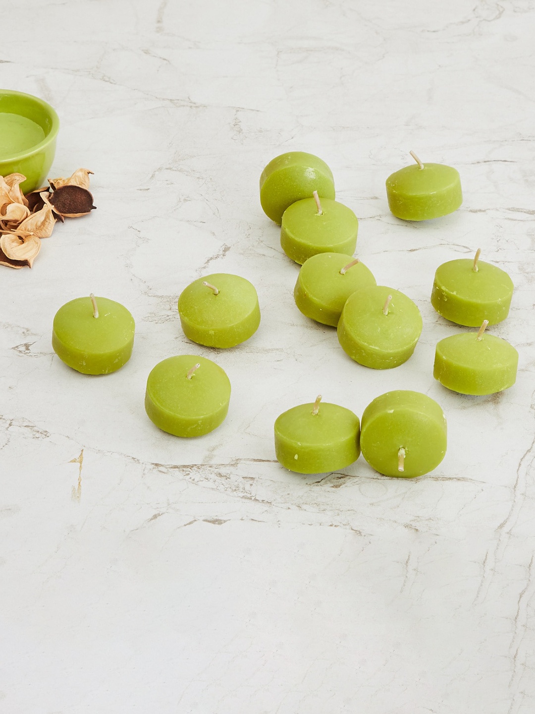 

Home Centre Set of 12 Green Colour Connect Round Wax Floating Candles