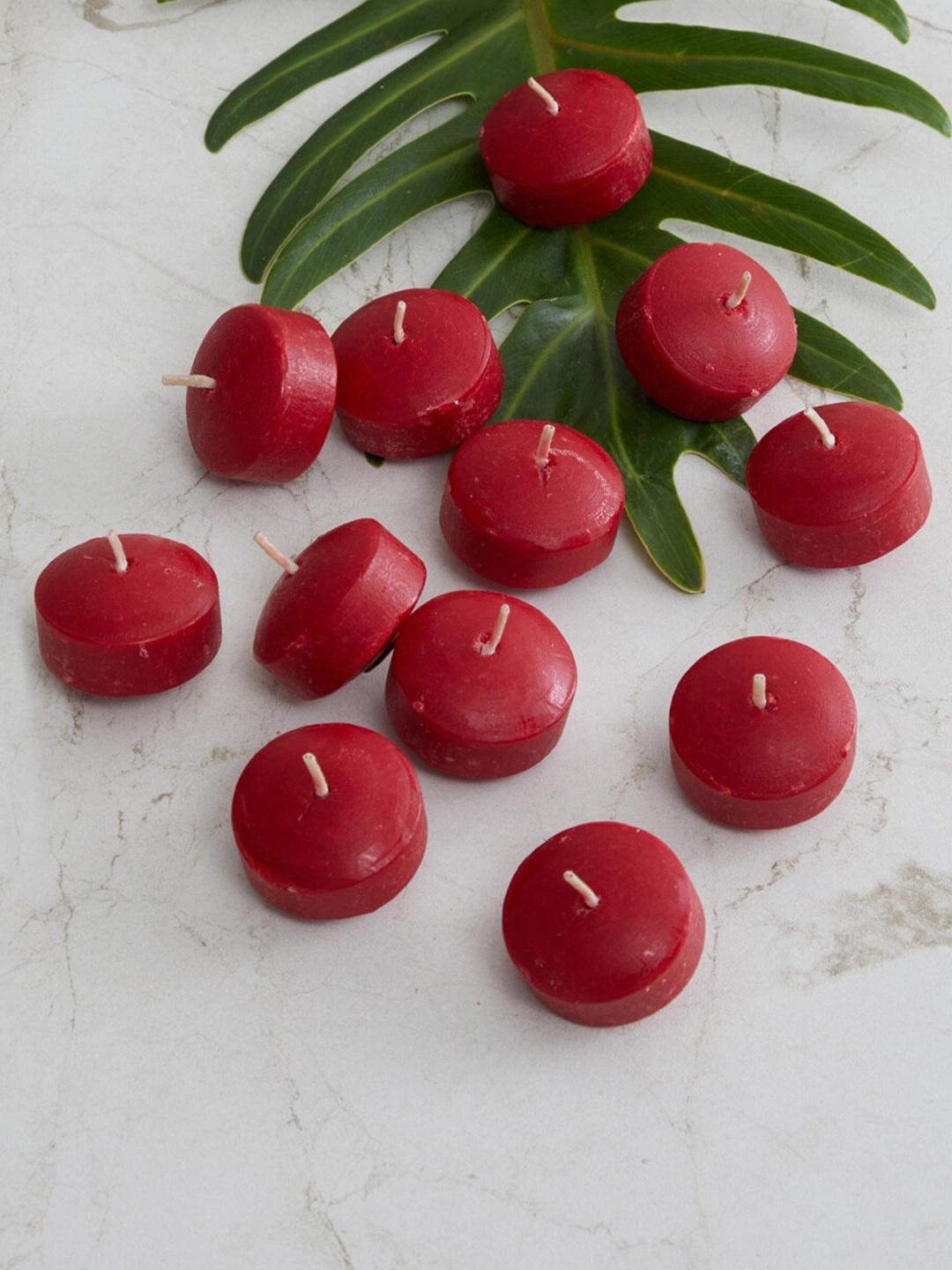 

Home Centre Red Set of 12 Pieces Colour Connect Solid Floating Nugget Candles
