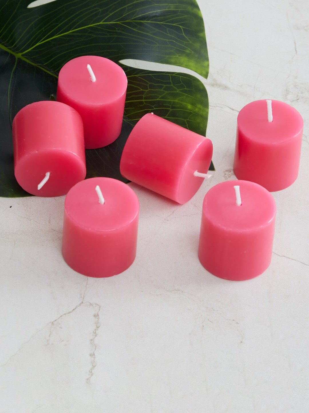 

Home Centre Set Of 6 Pink Votive Wax Candles