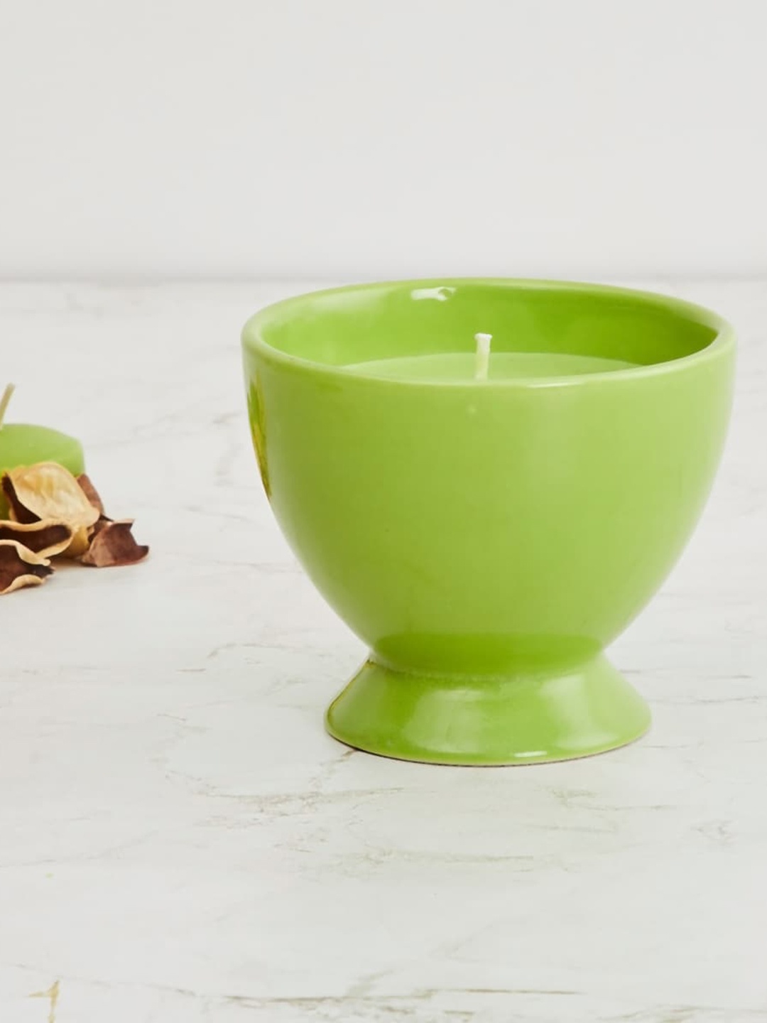 

Home Centre Green Ceramic Ice Cream Jar Scented Candle