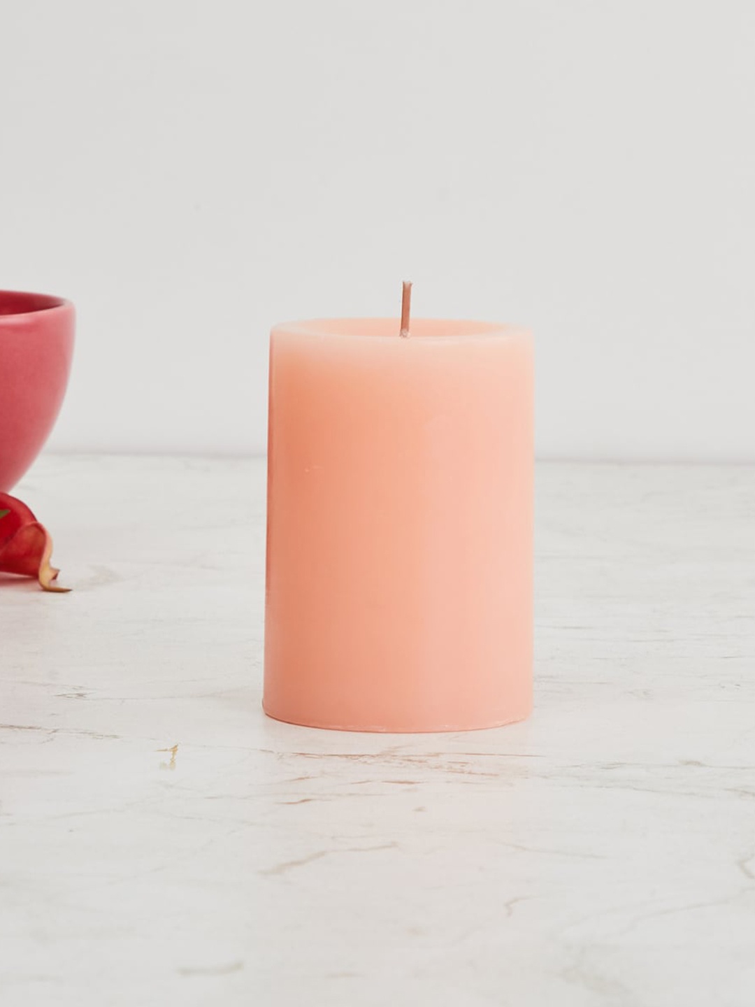 

Home Centre Peach-Coloured Redolence Solid Wax Candle