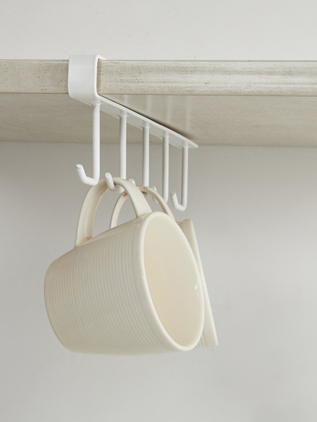 

Home Centre Off White Solid Metal Shelf Mug Hook