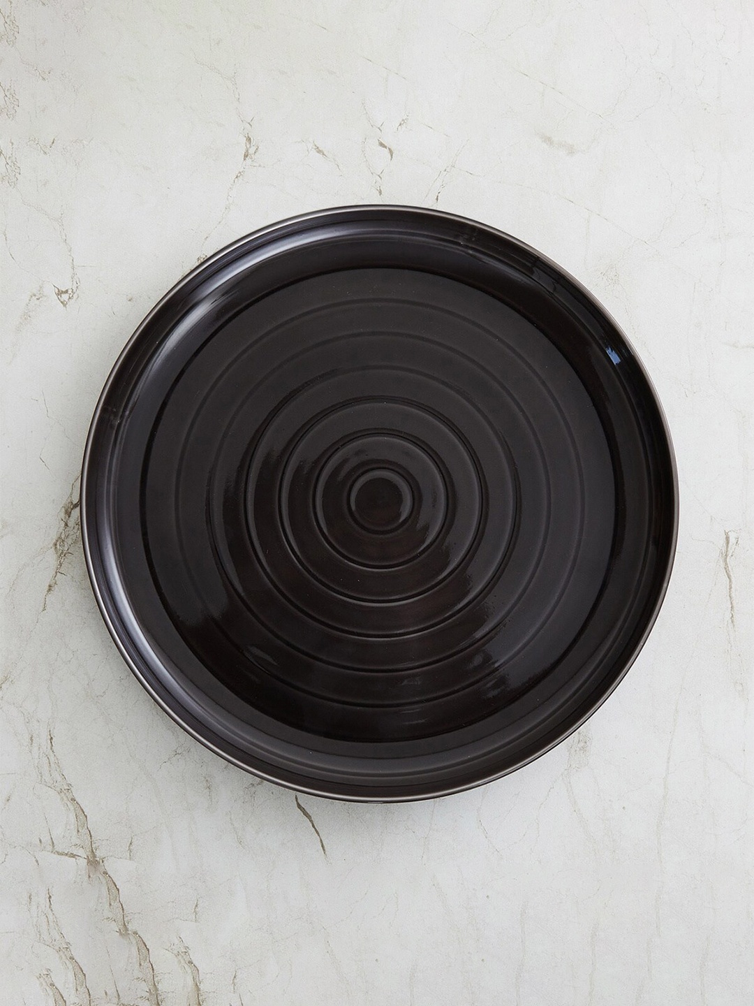 

Home Centre Grey 1 Pieces Geometric Textured Porcelain Glossy Plate