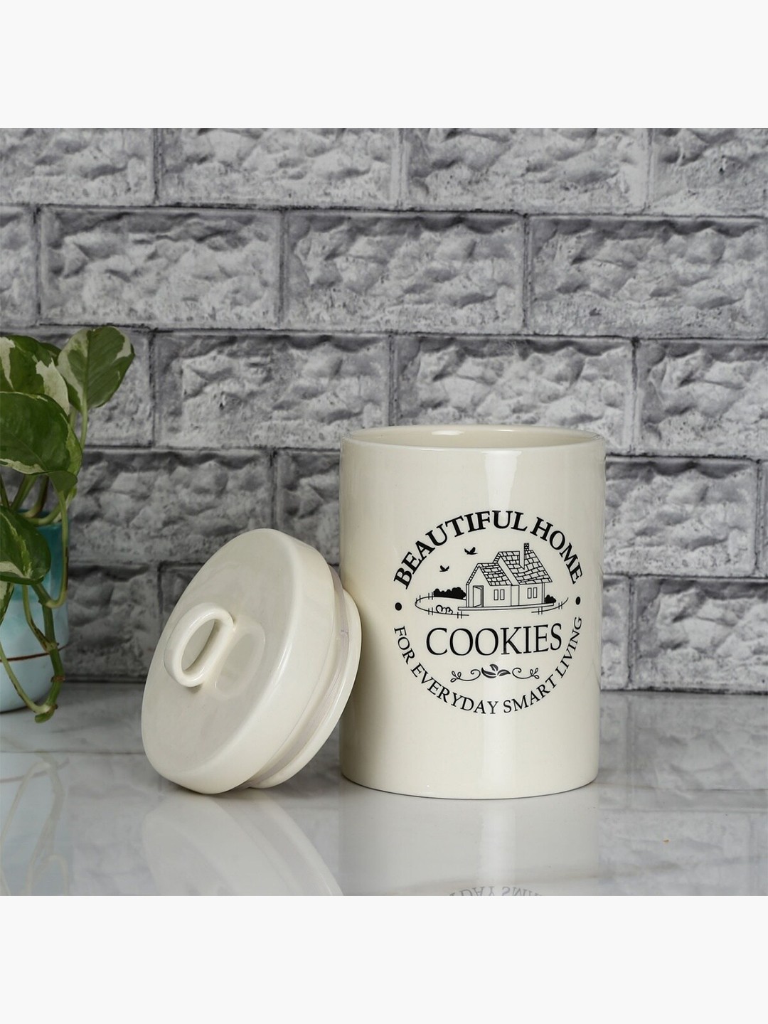 

Home Centre Unisex Beige & Black Printed Cookie Jar