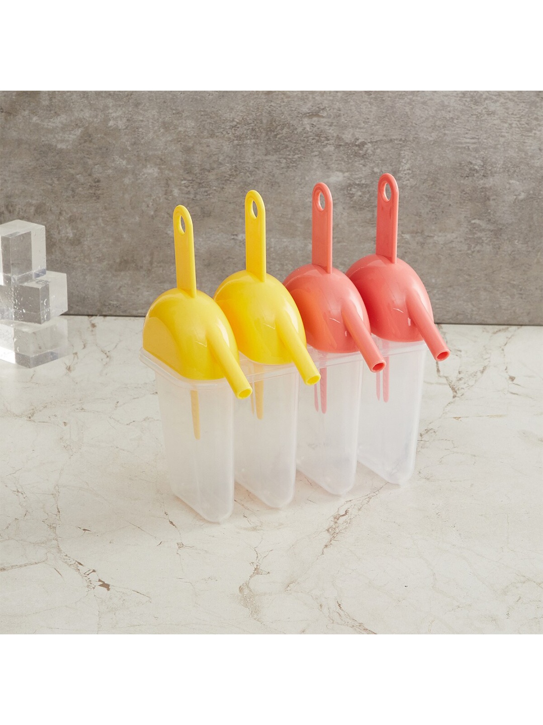 

Home Centre Set of 4 Yellow & Pink Freezer Popsicle Molds