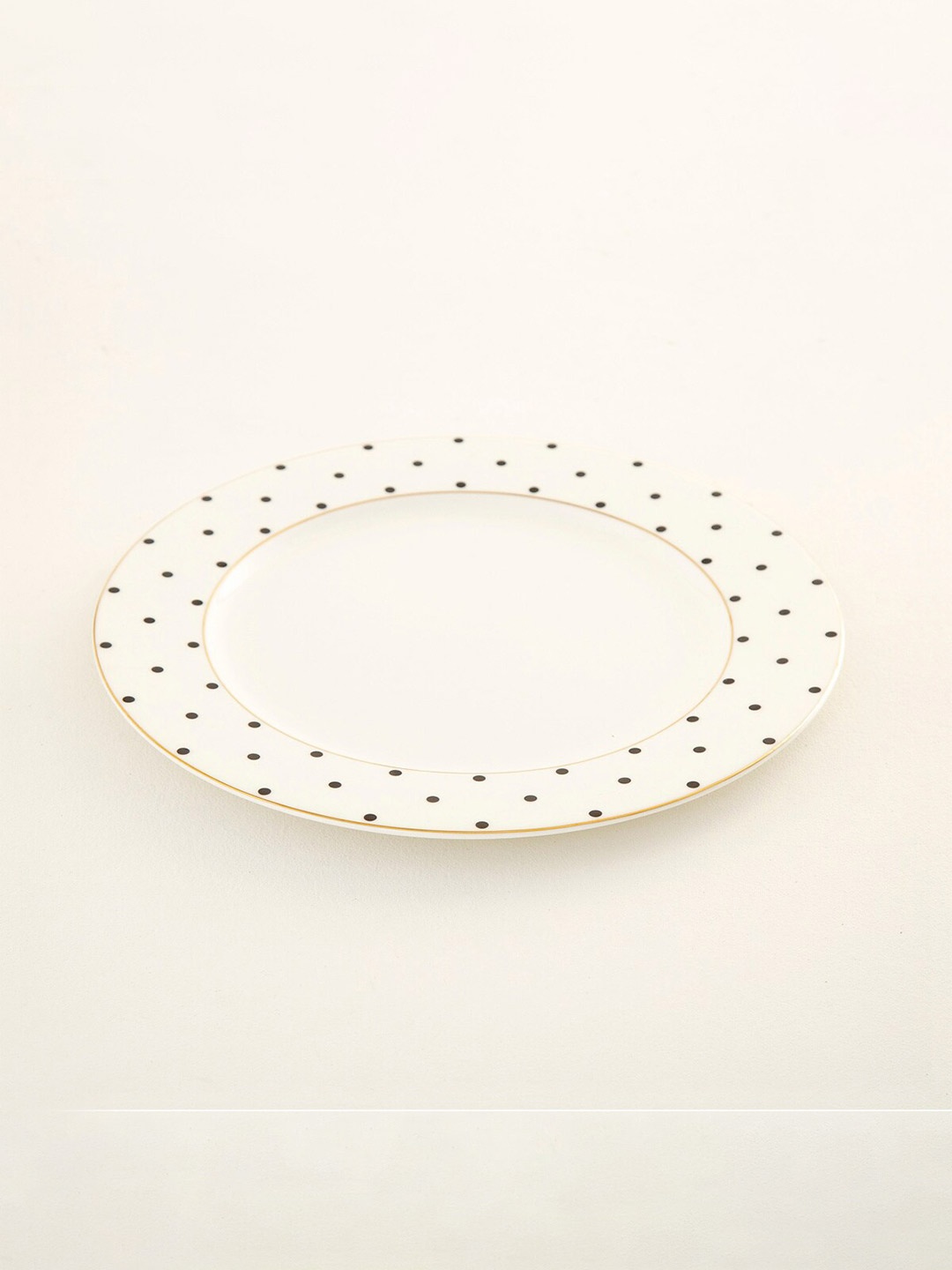 

Home Centre White & Black 1 Piece Printed Bone China Matte Plate