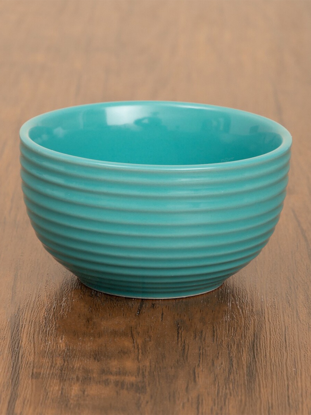 

Home Centre Blue & 1 Piece Textured Stoneware Glossy Bowl