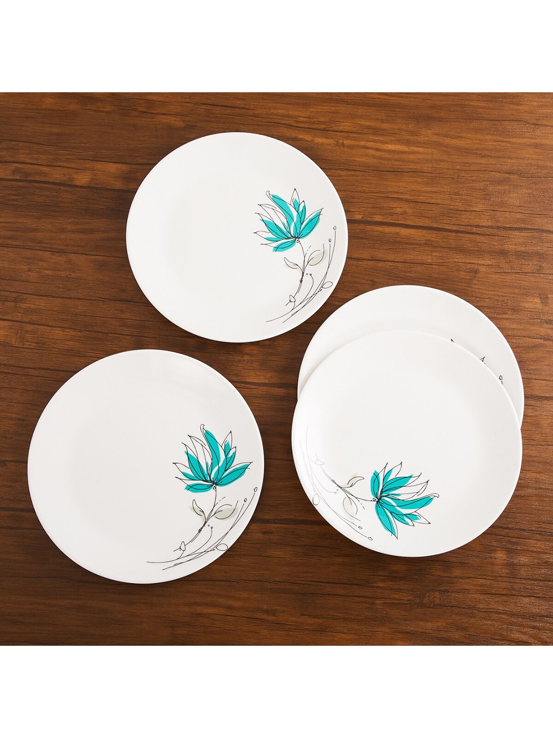 

Home Centre White & Blue 4 Pieces Printed Glass Glossy Plates