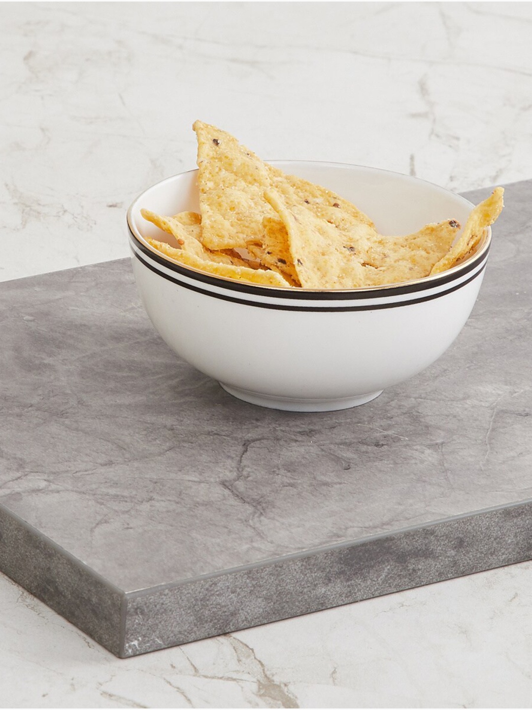 

Home Centre White & Black 1 Piece Bone China Glossy Bowl