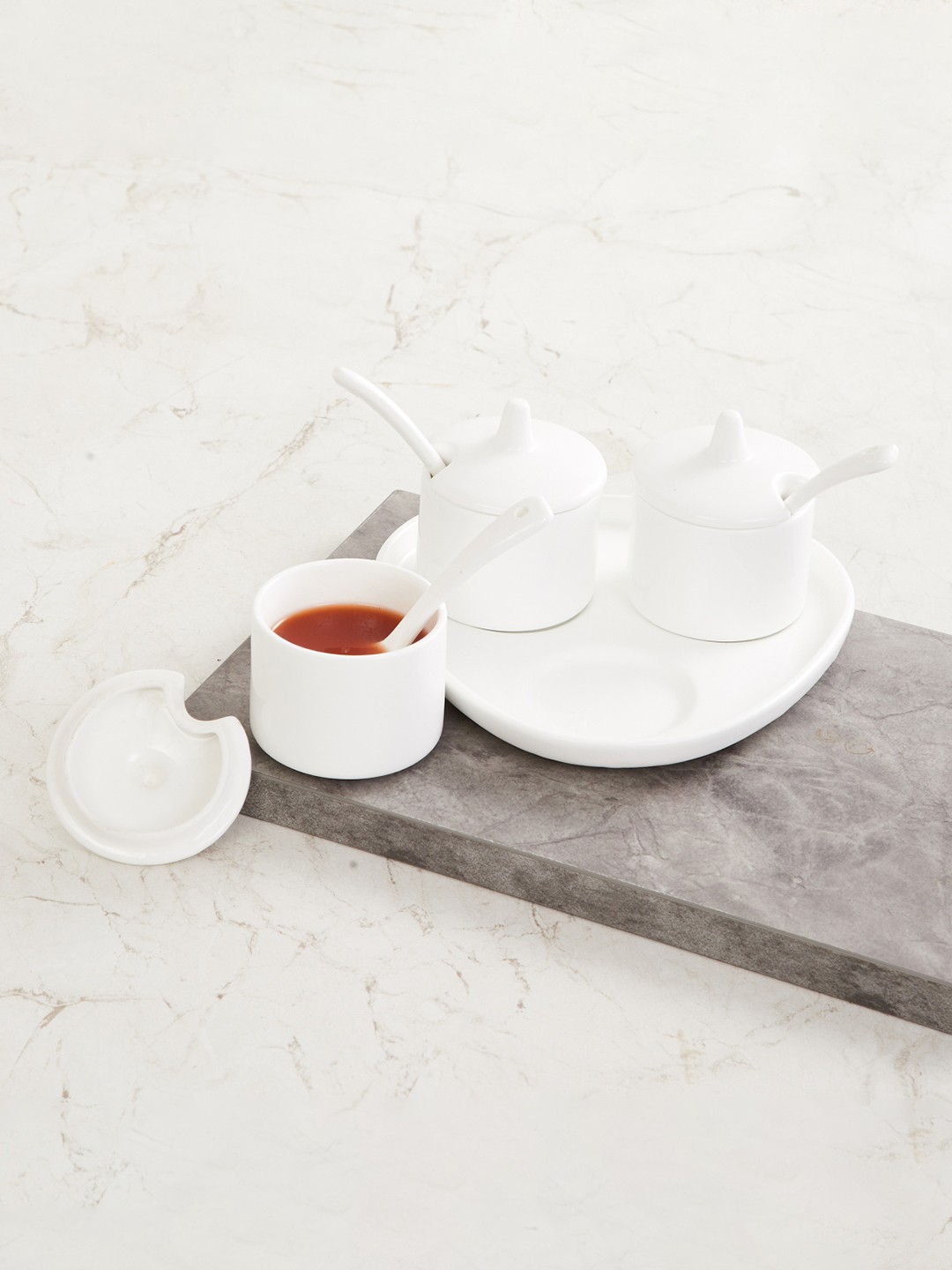 

Home Centre White 10 Pieces Melamine Glossy Pickle Tray Set
