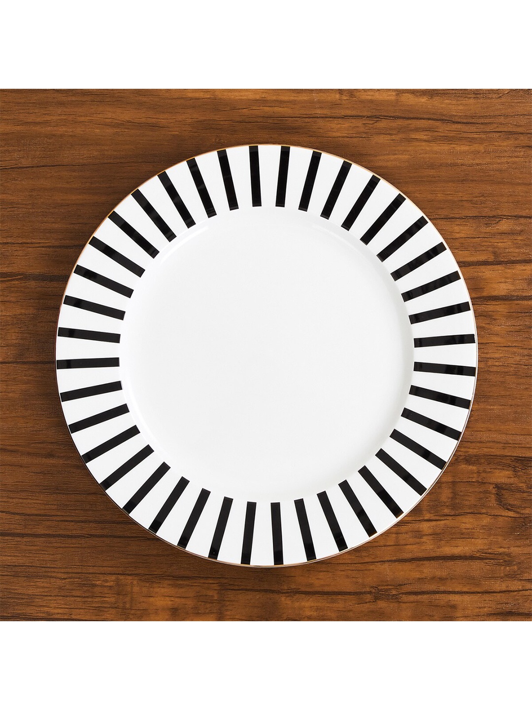 

Home Centre White & Black Pieces Printed Bone China Glossy Plates